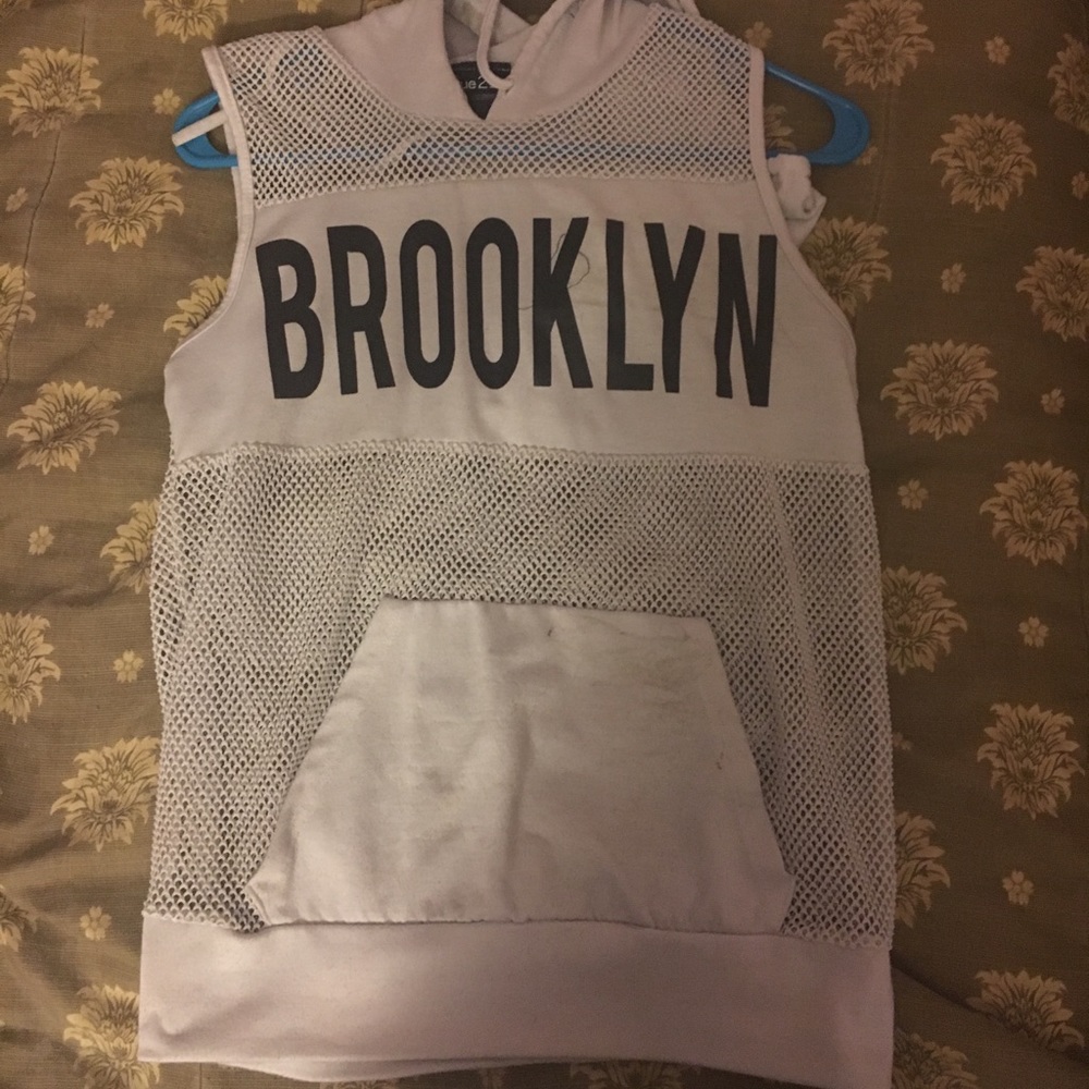 Cropped, sleeveless hoodie.